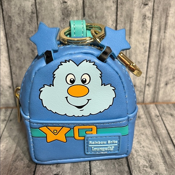 Loungefly Handbags - Loungefly MINI BAG CHARM Backpack Blue Rainbow Brite 🌈